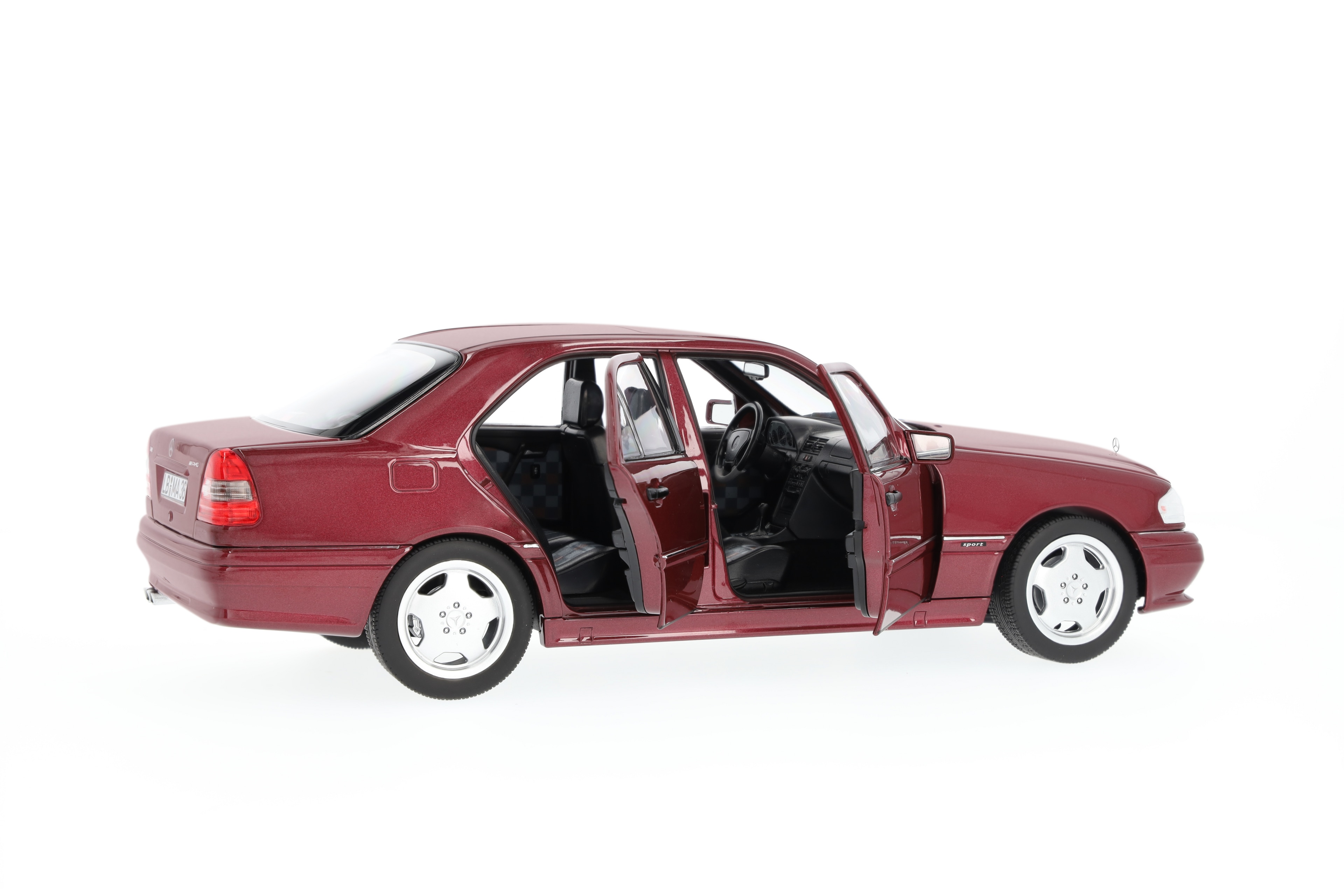 C 36 AMG Limuzyna W 202 (1993–1997) - czerwień almandyny, Norev, 1:18