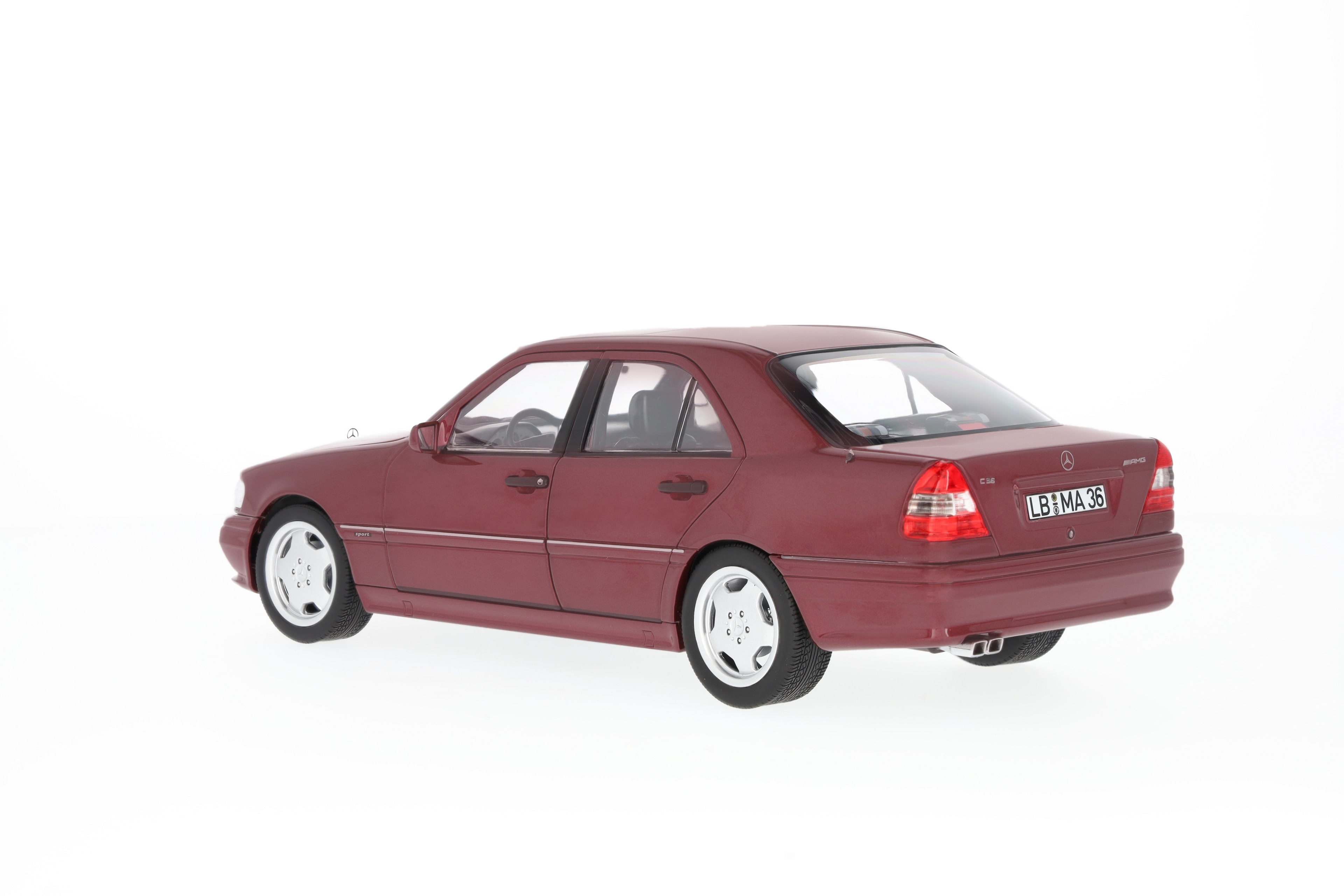 C 36 AMG Limuzyna W 202 (1993–1997) - czerwień almandyny, Norev, 1:18
